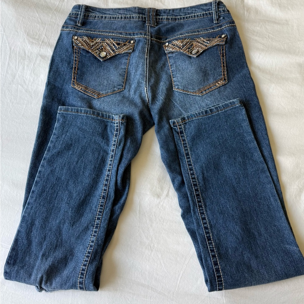 Lei Taylor Low Rise Skinny Y2k Blue Denim with Brown Stitching and Studs.